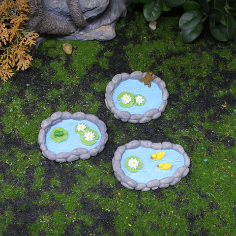 Whlo4U turtle pond ornament creates a focal point in a miniature garden.