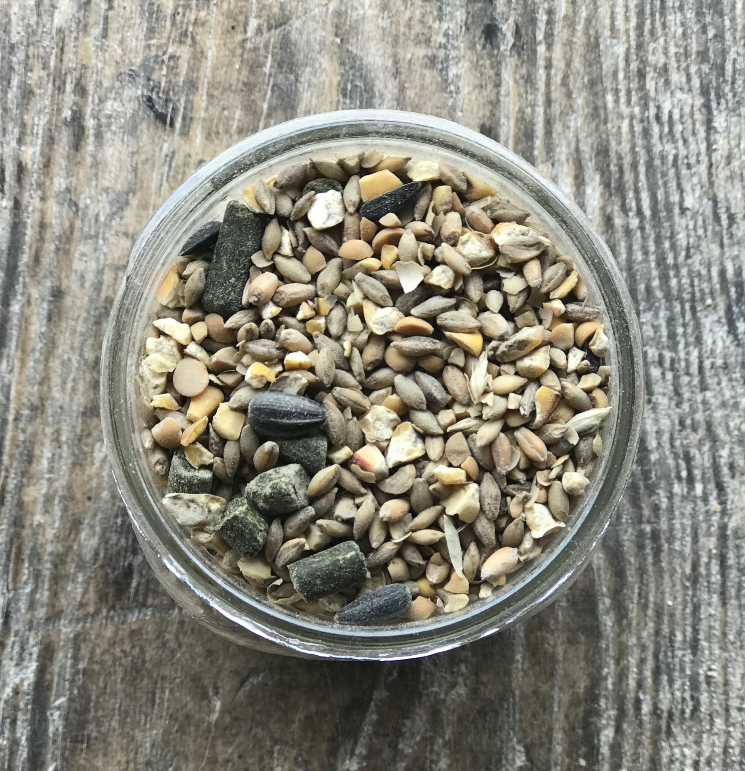 Wholesome Harvest goat feed ingredients highlight barley, alfalfa, and roasted soybeans.