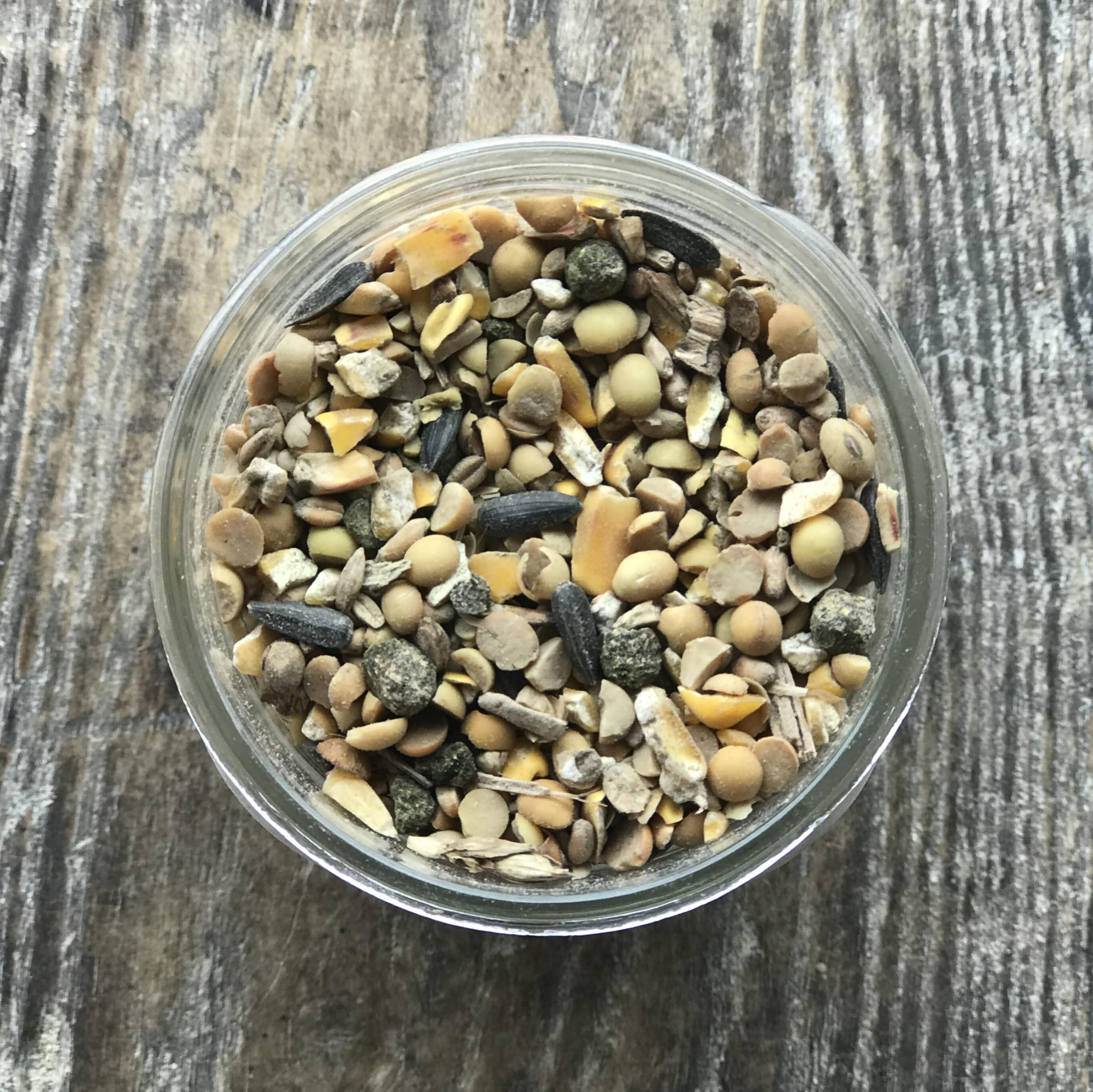 Wholesome Harvest turkey feed nutrition label highlights non-GMO ingredients.