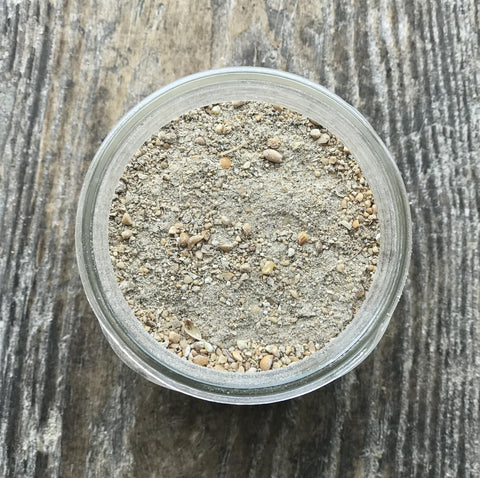 Wholesome Harvest pellets close-up highlights protein-rich formula for vigor.
