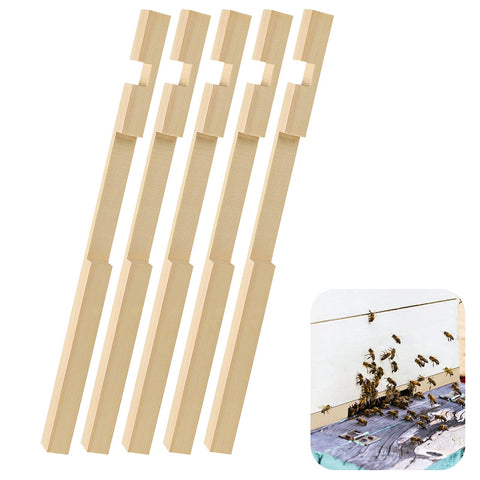 Whumsdog entrance reducer fits a 10-frame hive, allowing adjustable openings.