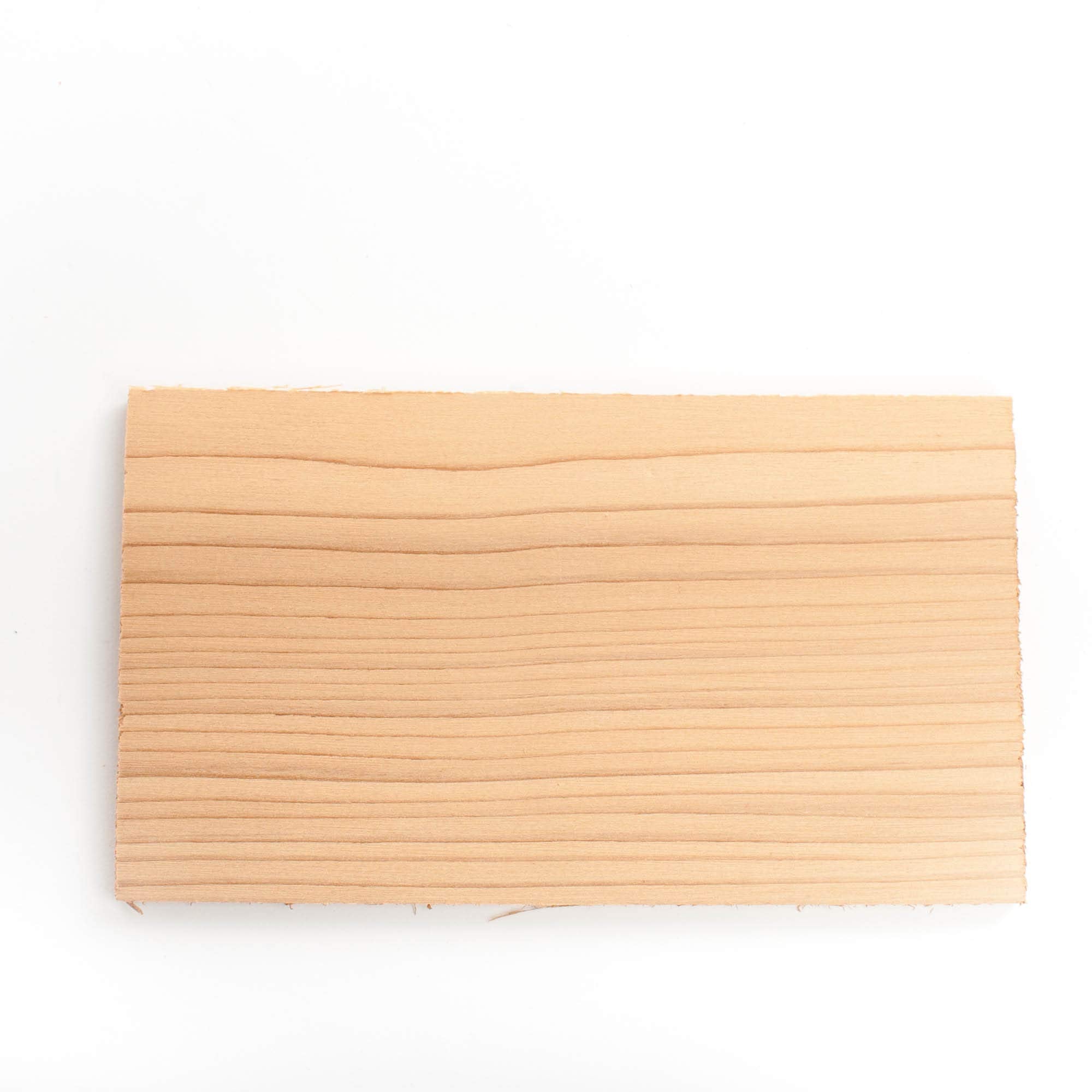 Wildwood Grilling cedar plank texture highlighting natural wood quality.