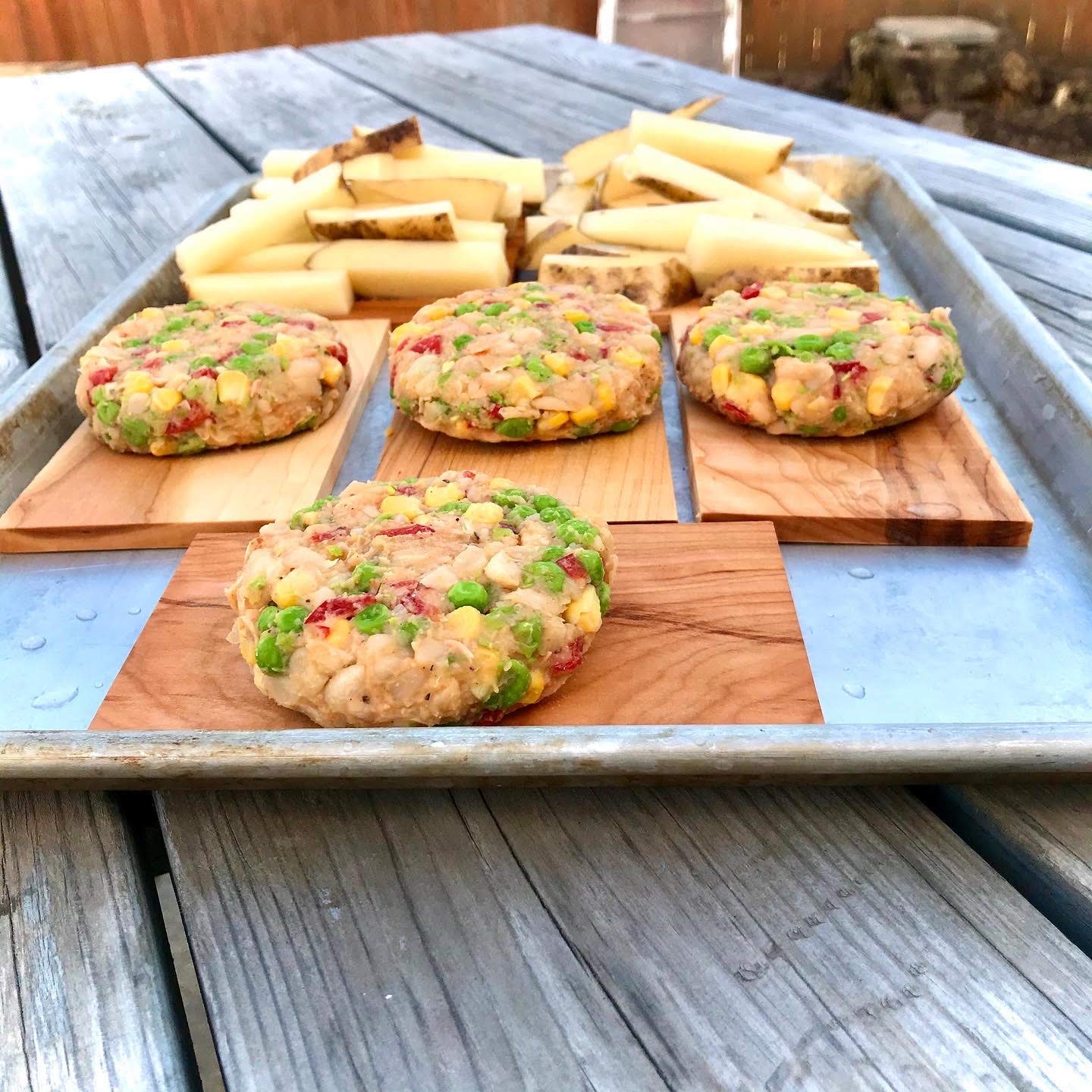 Wildwood Grilling restaurant plate on cedar plank for elegant presentation.
