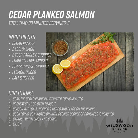 Wildwood Grilling salmon filet on cedar plank for aromatic cooking.