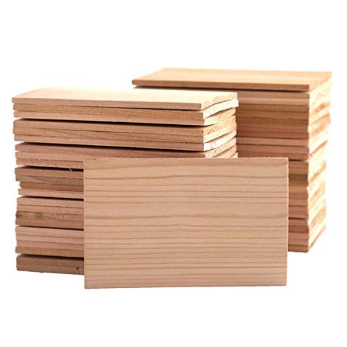 Wildwood Grilling 50-pack cedar planks on a grill ready for restaurant use.
