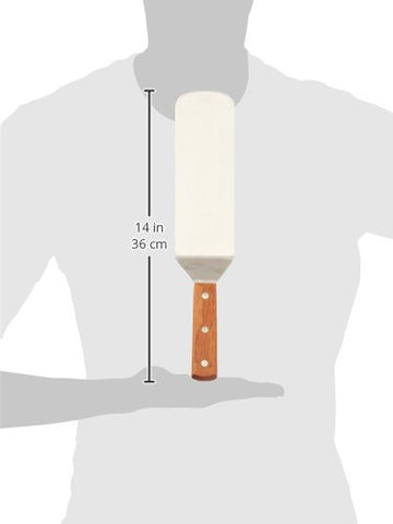 Winco flexible turner with offset handle demonstrates safe lifting off hot surfaces.