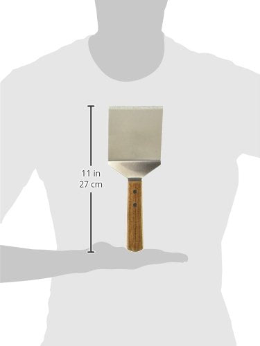 Winco TN46 offset-handle spatula shown lifting food safely away from heat.