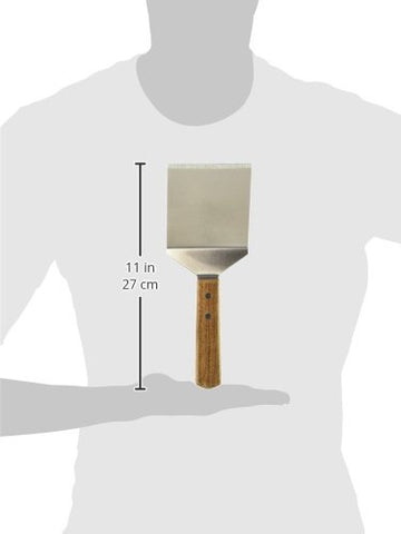 Winco TN46 offset-handle spatula shown lifting food safely away from heat.