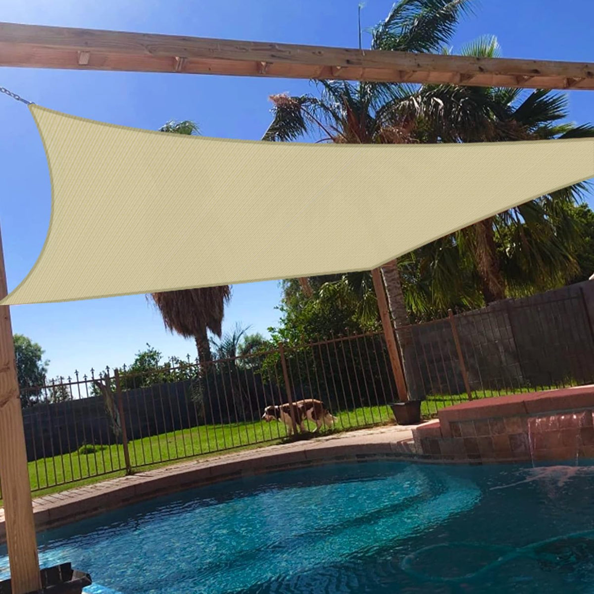Windscreen4less sun shade sail 10x14 beige blocks sun and creates a cool backyard retreat.