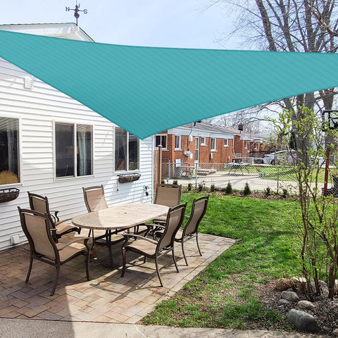 Windscreen4less sun shade triangle turquoise over patio provides cooling outdoor shade