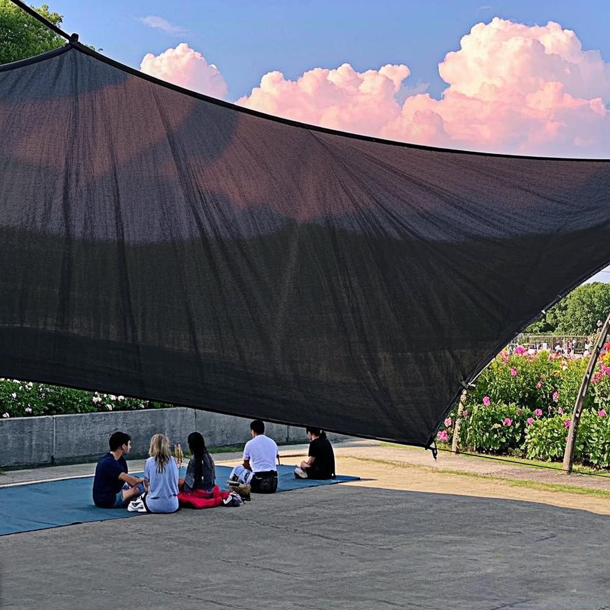 Winemana patio shade net creates cooler outdoor seating.