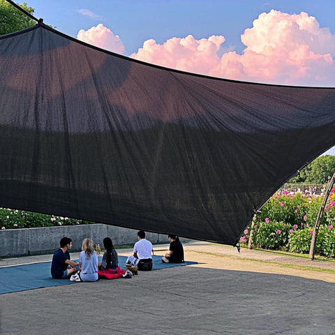Winemana patio shade net creates cooler outdoor seating.
