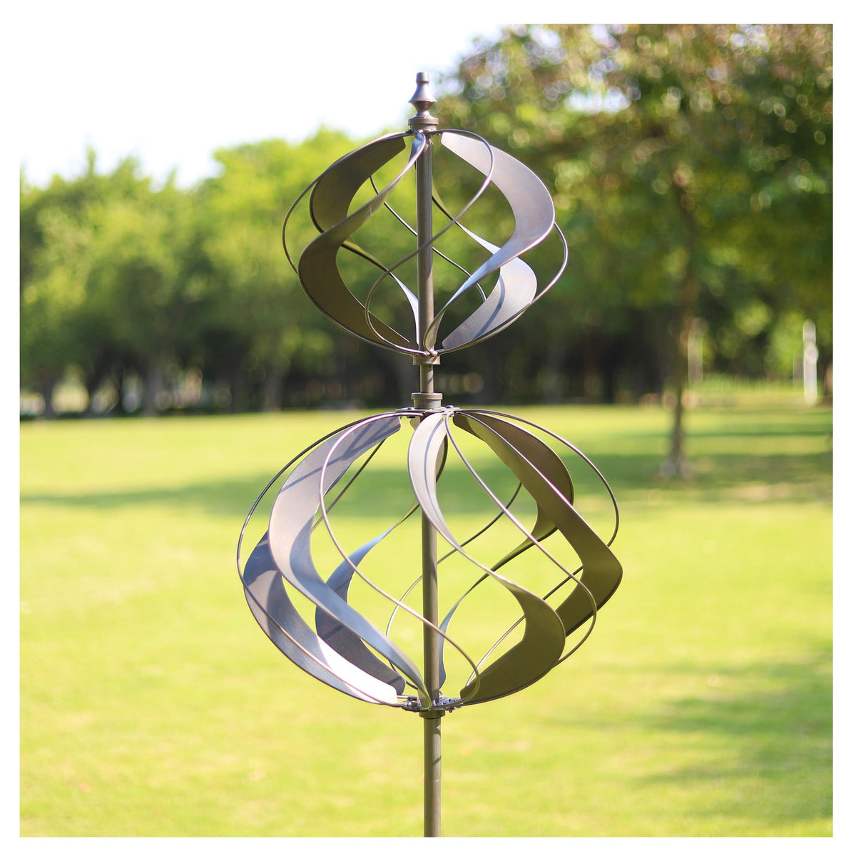 WinWindSpinner dual-globe spinner with layered globes catching sunlight for dynamic garden decor.