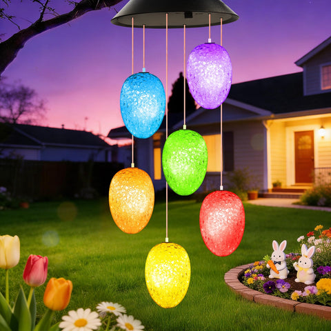 Winzwon solar eggs wind chimes illuminate the garden at night with color-changing glow.