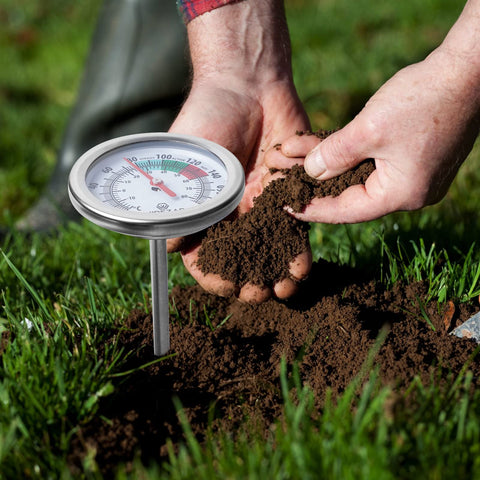 Wirezar stainless steel thermometer dial close-up for reliable outdoor soil measurements.