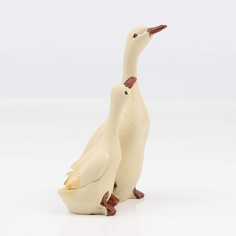 Wisifayardin goose figurine table decor complements rustic farmhouse style.