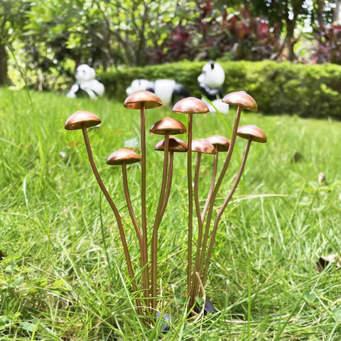 Wissppoott mushroom stakes with four straps for secure display.