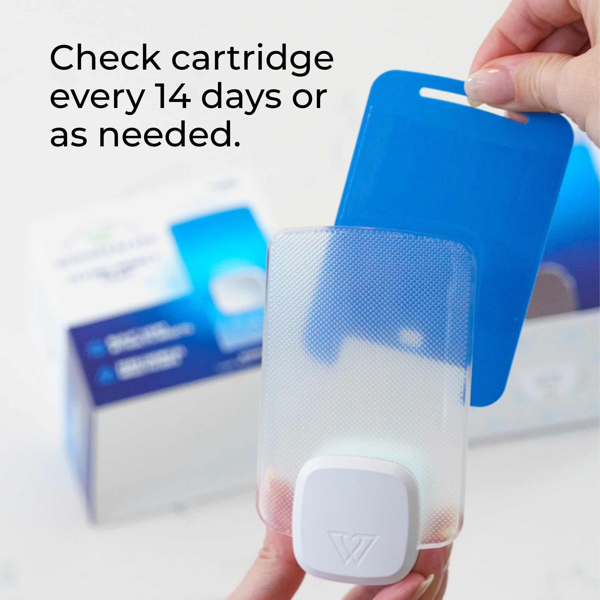 Close-up of Wondercide refill cartridge highlighting Blu-V light attractant