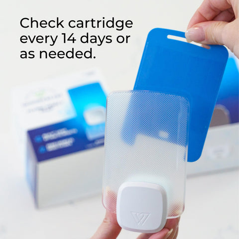 Close-up of Wondercide refill cartridge highlighting Blu-V light attractant