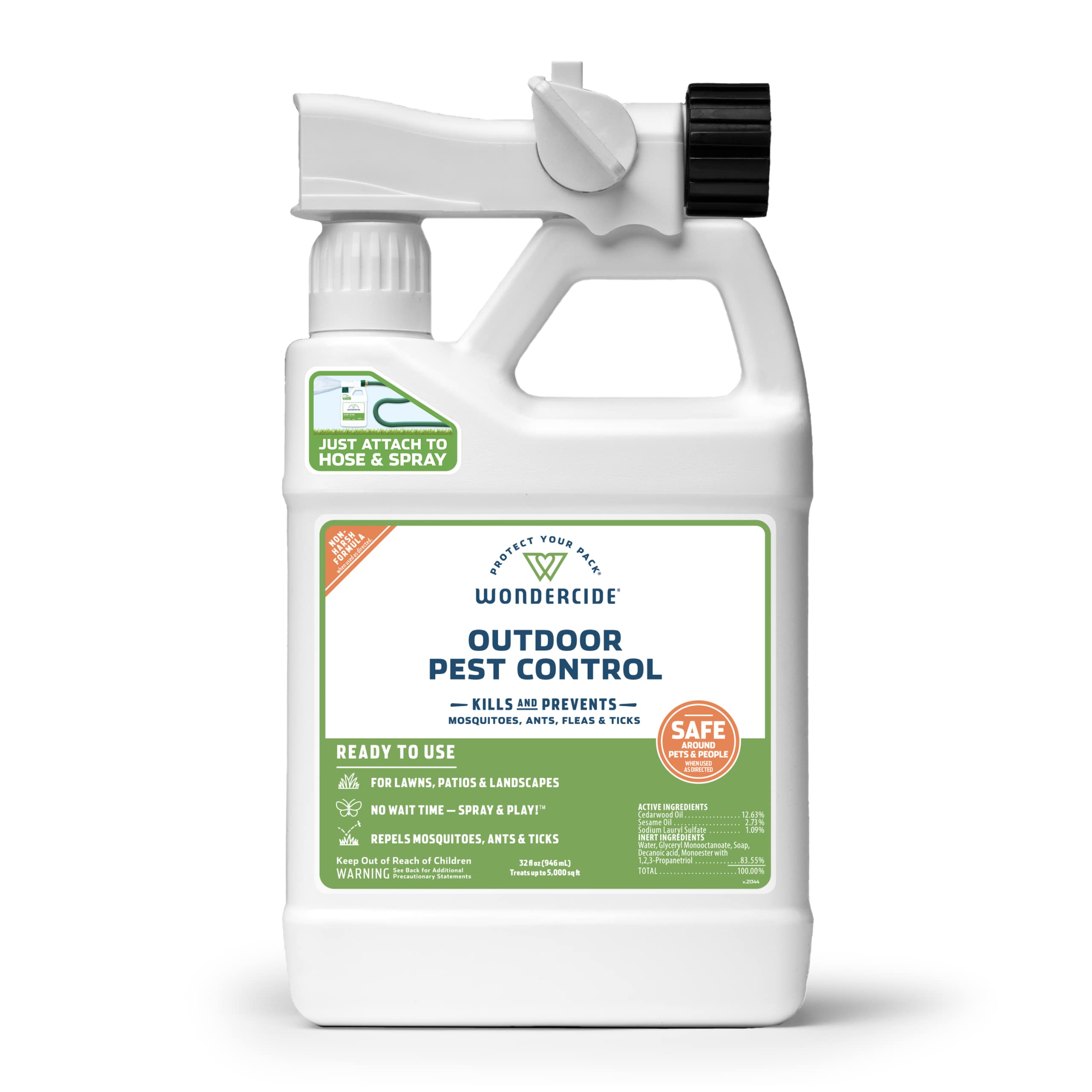 Wondercide Outdoor Pest Control Spray attached to hose for quick backyard protection.