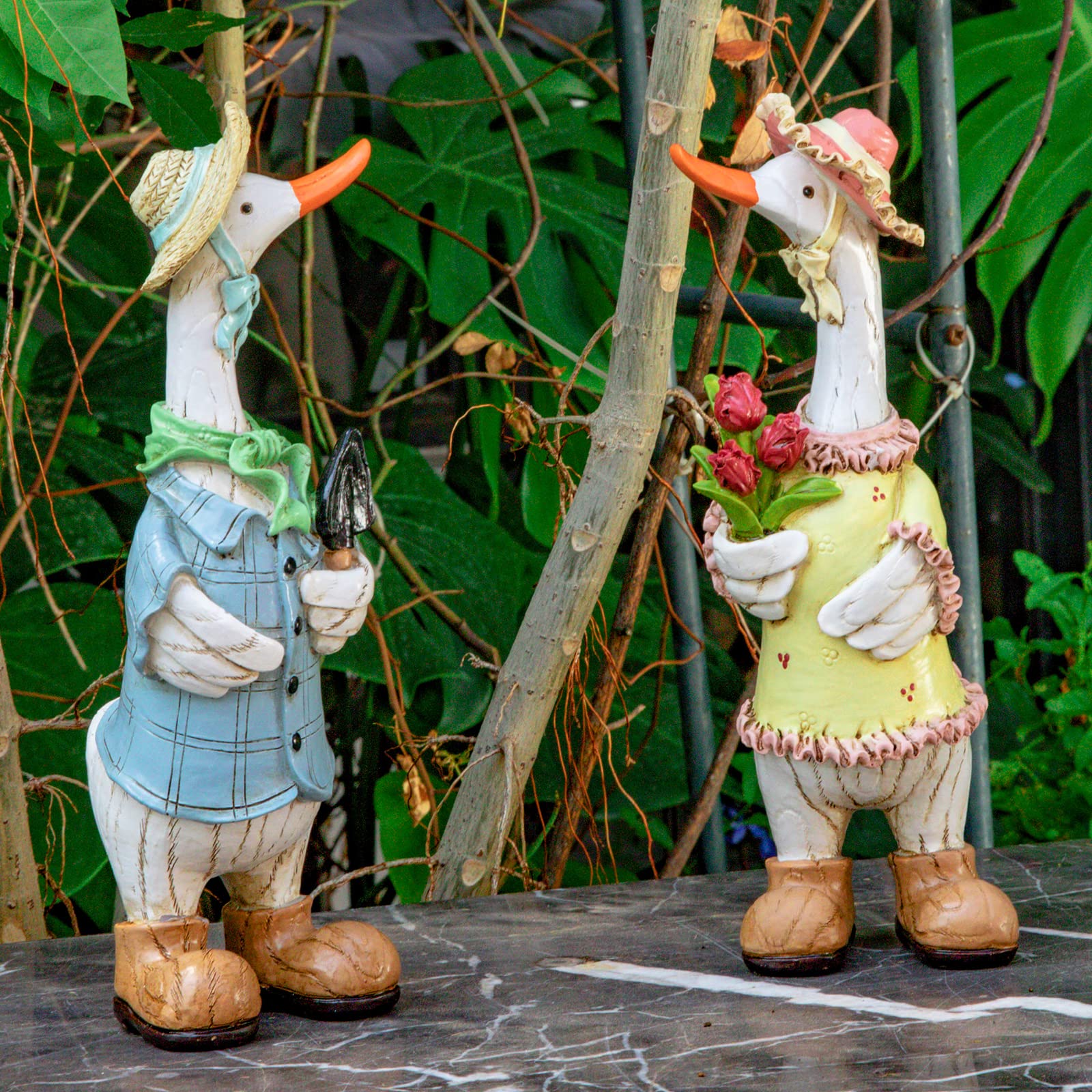 WONDHOME duck statues indoors on countertop or shelf.