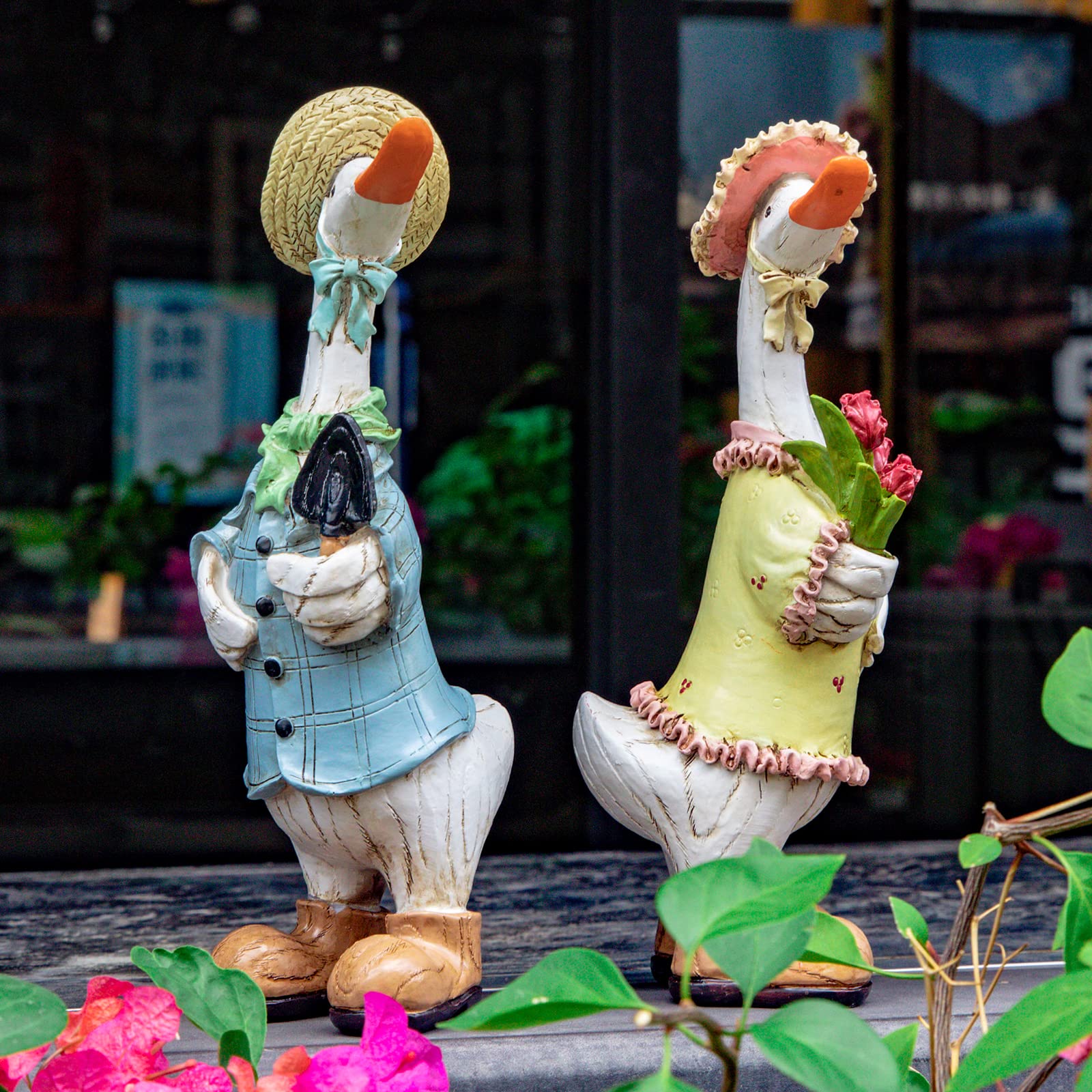 WONDHOME ducks statues in a yard scene for curb appeal.