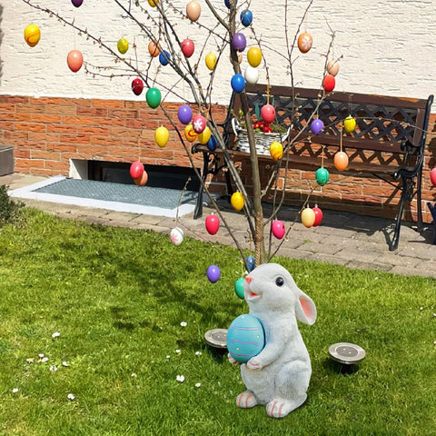 WONDHOME hand-painted spring bunny decor adds vibrant color to porches.