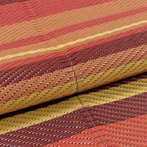 WondRg lightweight foldable rug packed for camping and travel.