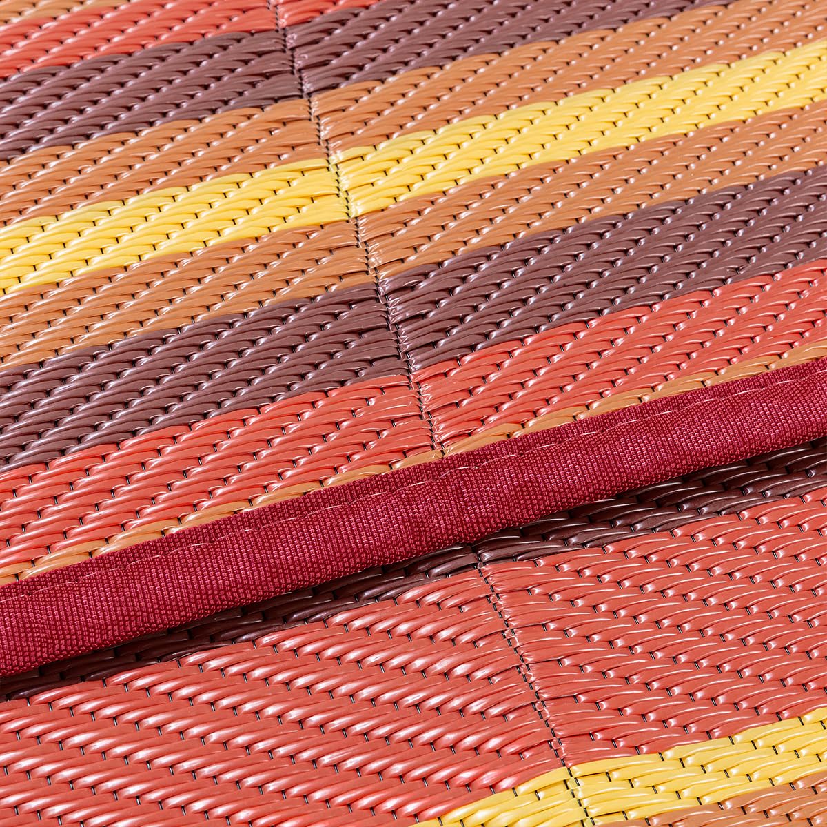WondRg patio mat on porch or deck with UV resistance and color-rich stripe.