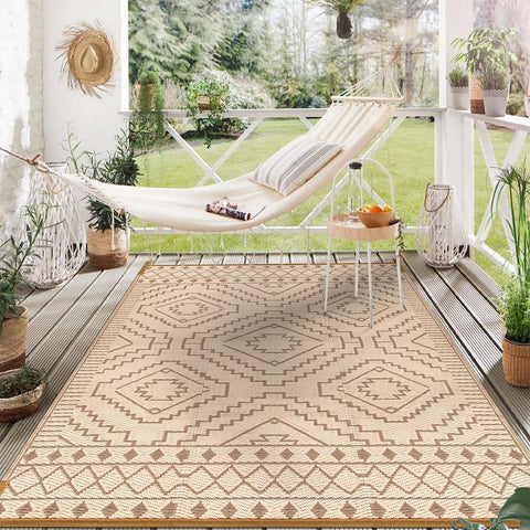 Wonnitar Outdoor Rug beige-brown-6x9 blends with natural spaces.