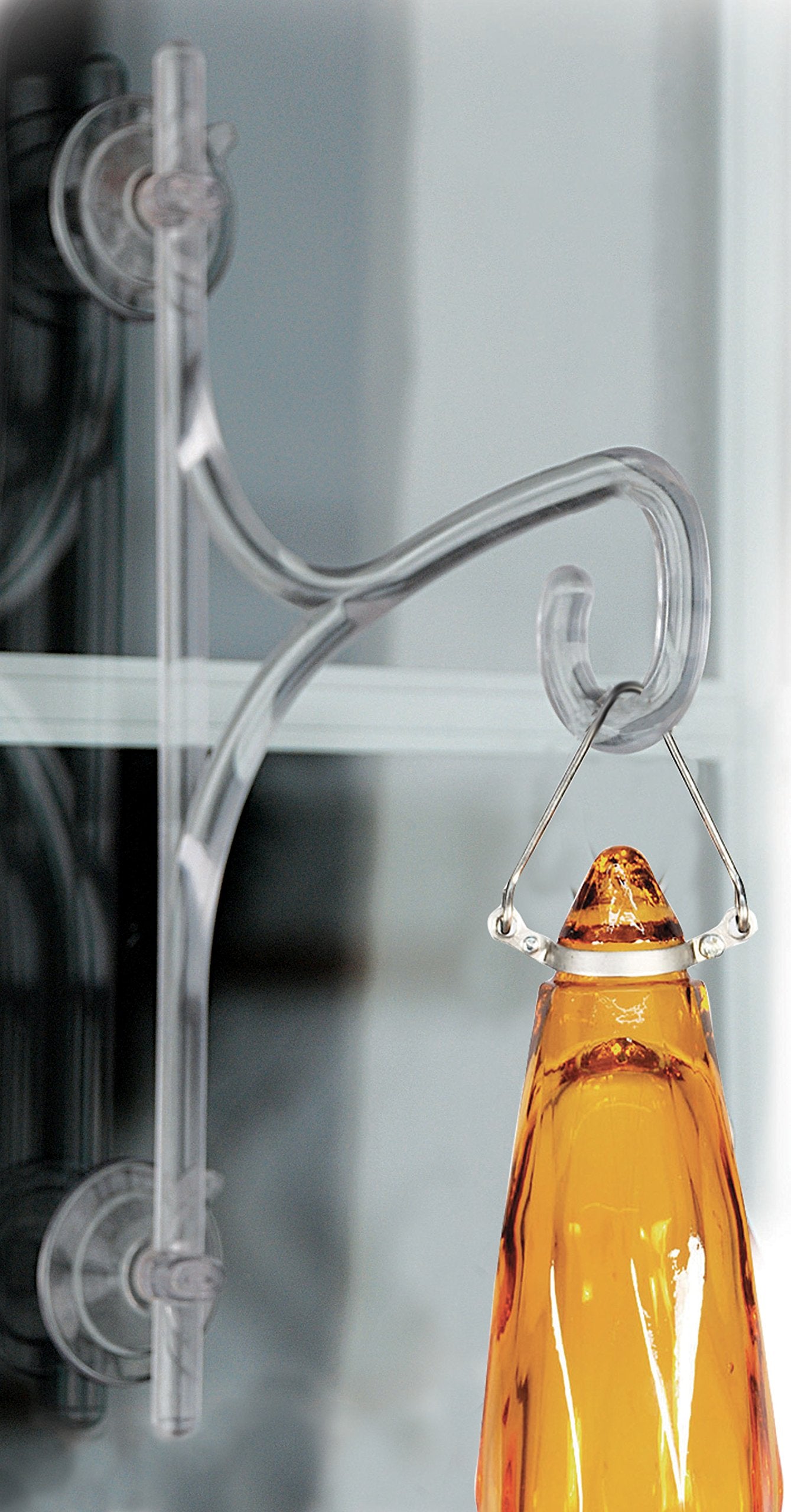 Woodlink Window Hanger suction cups close-up shows secure mounting for feeders.