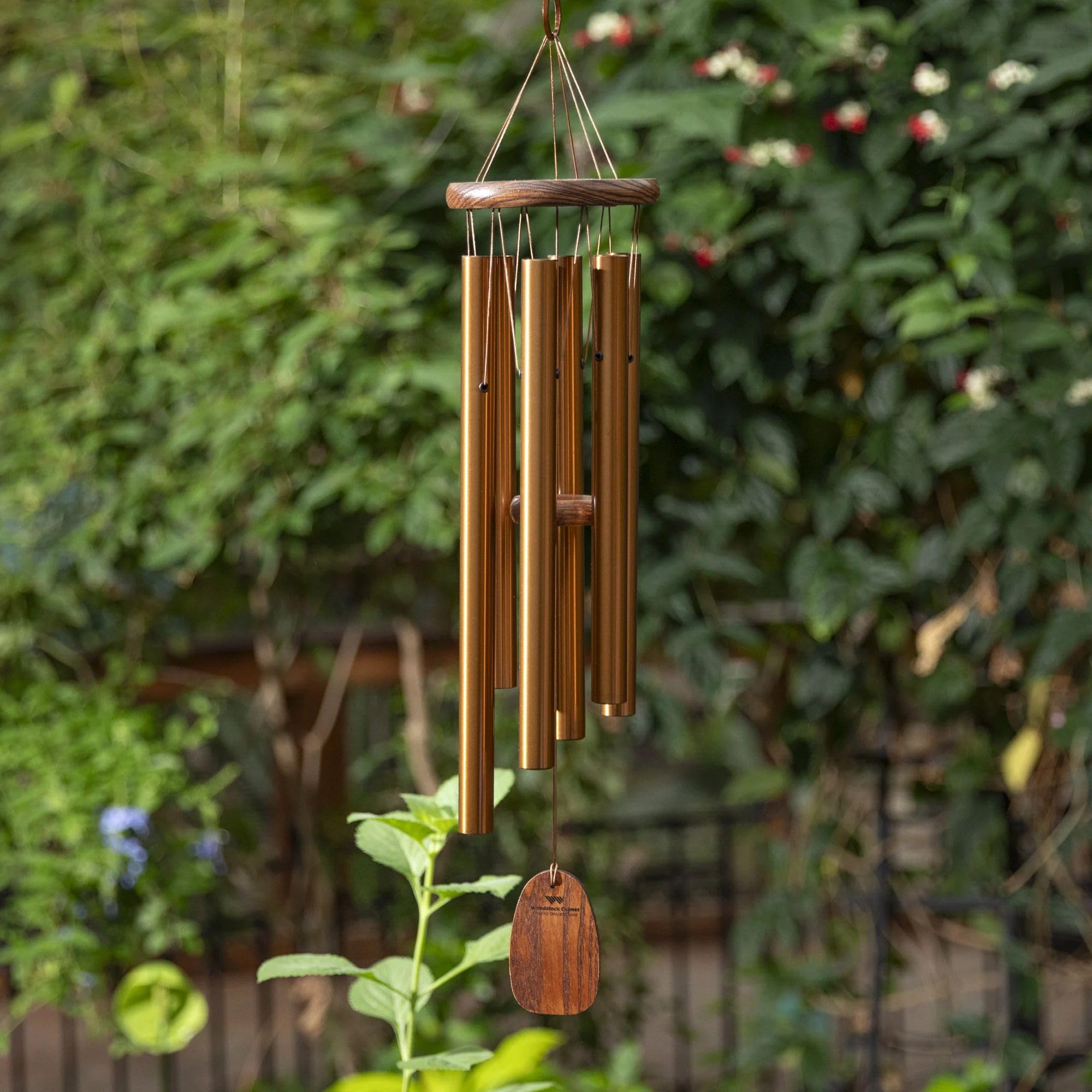Woodstock Chimes Amazing Grace front porch display adds garden decor and atmosphere.