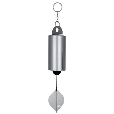 Woodstock Chimes Heroic Windbell 24-inch silver in sunlight provides a soothing outdoor ambience.