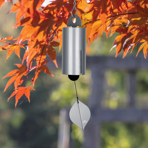Woodstock Chimes Heroic Windbell deep-tone sound echoes through a garden for peaceful moments.
