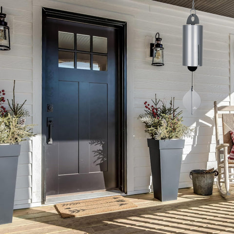 Woodstock Chimes Heroic Windbell outdoor decor on a patio enhances space with gentle music.