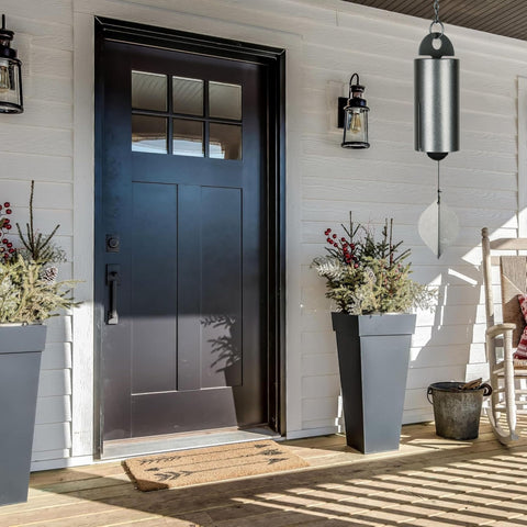 Woodstock Chimes Heroic Windbell mounted as outdoor porch decor
