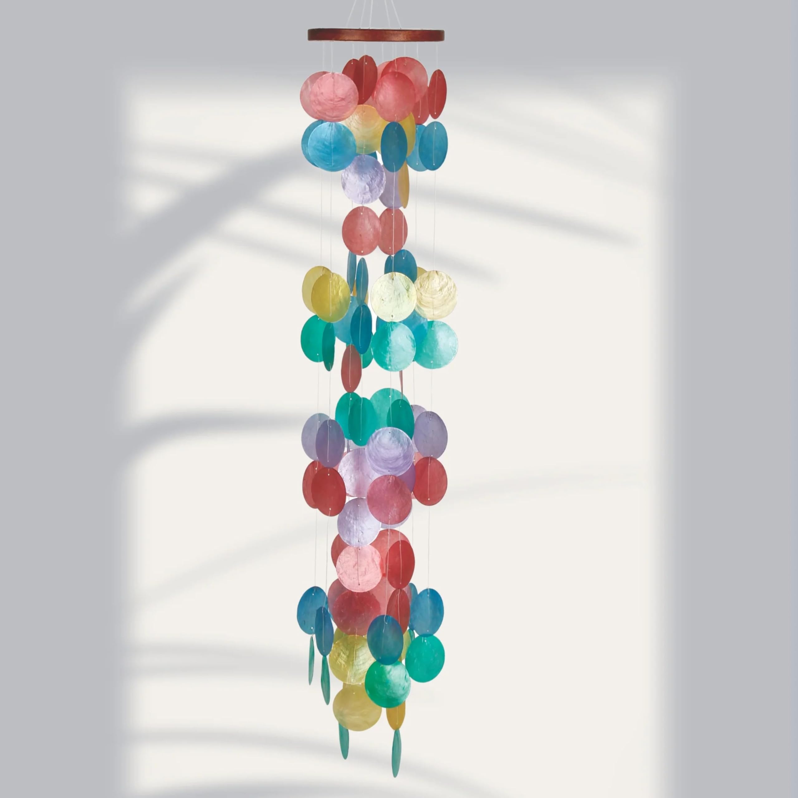 Woodstock Chimes solid wood top detail highlighting authentic Indonesian craftsmanship.