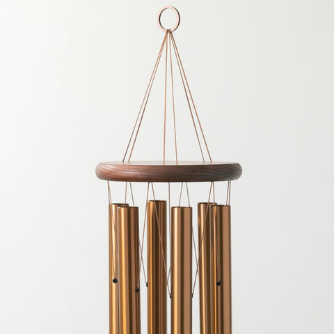 Woodstock Chimes teak finish ash wood offers durable, warm-toned garden decor