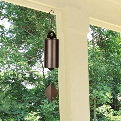 Woodstock Heroic Windbell close-up shows antique copper bell and patina for outdoor charm.