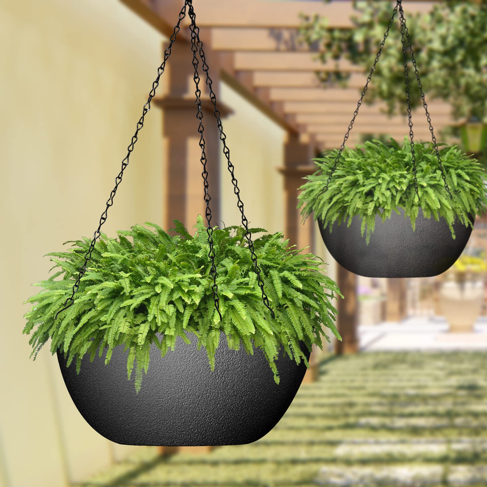 WOUSIWER black plastic planter on a porch demonstrates weather resistance.
