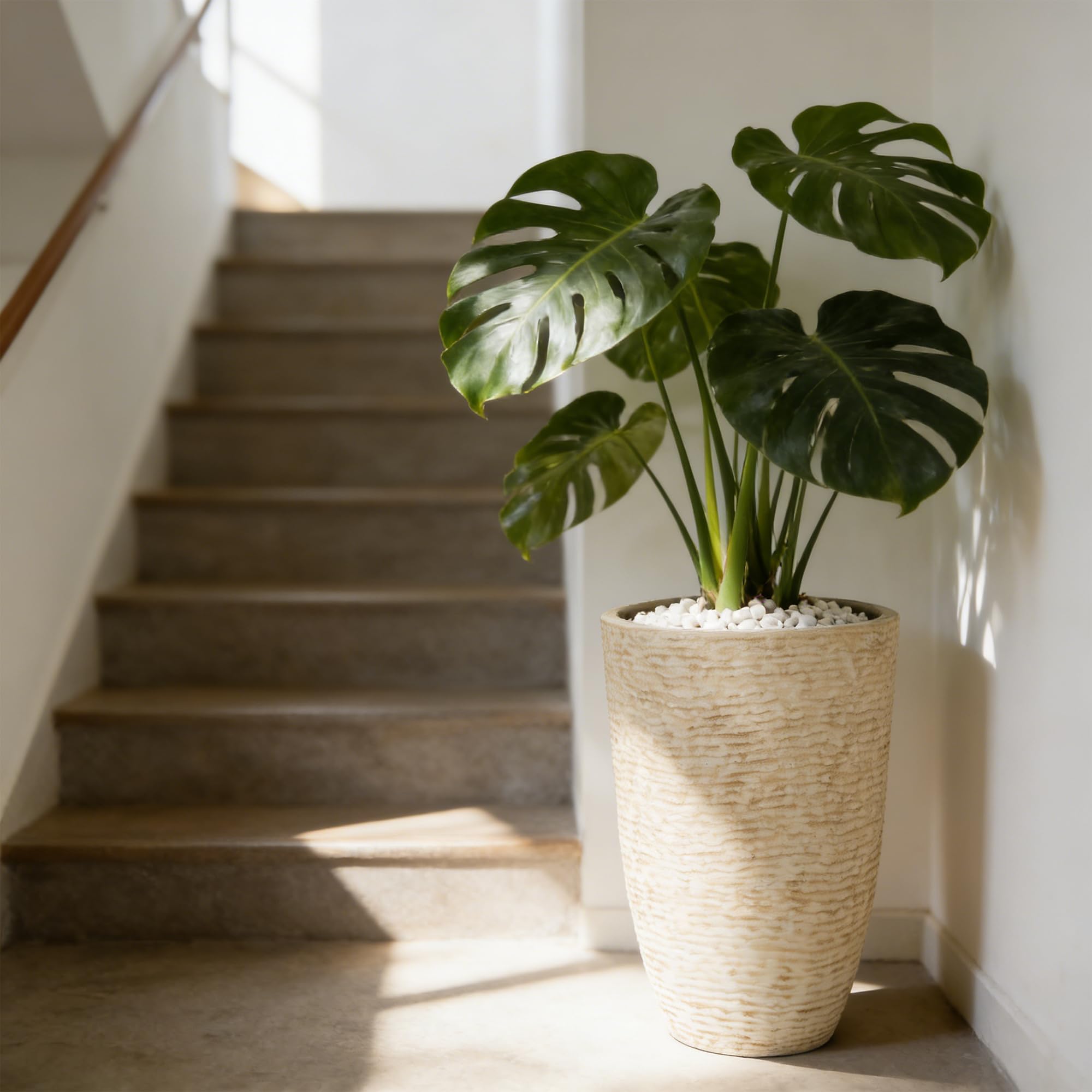Worth 9-Gallon Tall Planter drainage-hole-plug enables flexible indoor or outdoor watering.