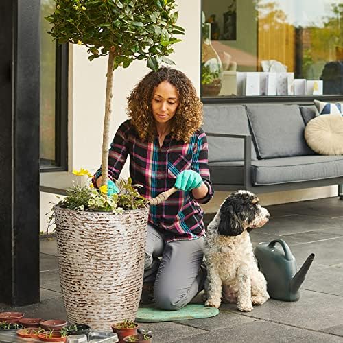 Worth 9-Gallon Tall Planter lightweight stone-look material for easy handling.