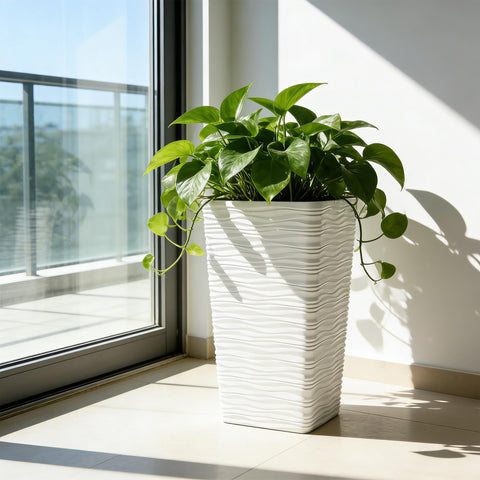 Worth Garden planter with drainage hole supports outdoor drainage and plant health.