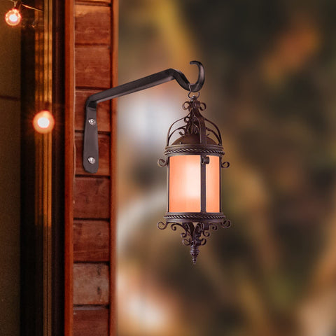 Worth Garden outdoor scene, black iron bracket on wall, multipurpose hanging solution