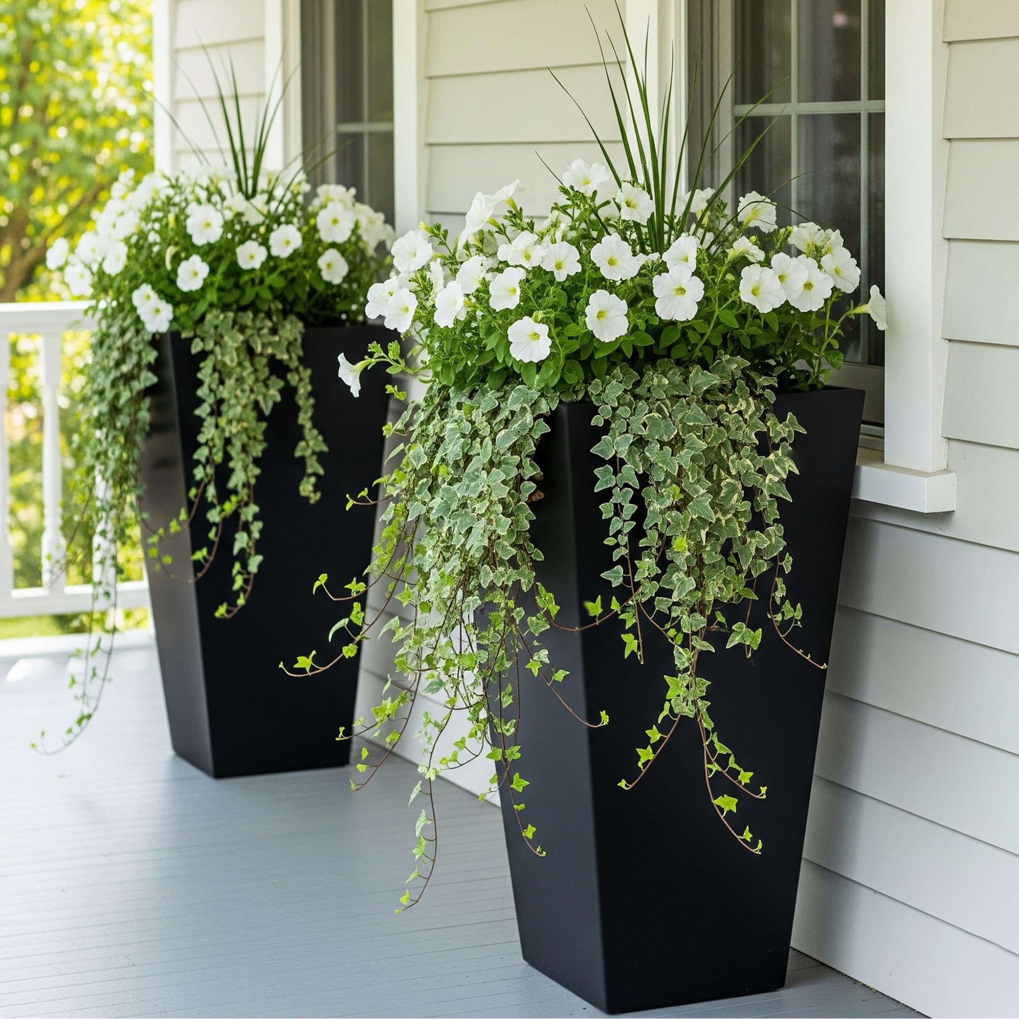Worth Garden planters set of 2 on outdoor patio showcasing durable black plastic.