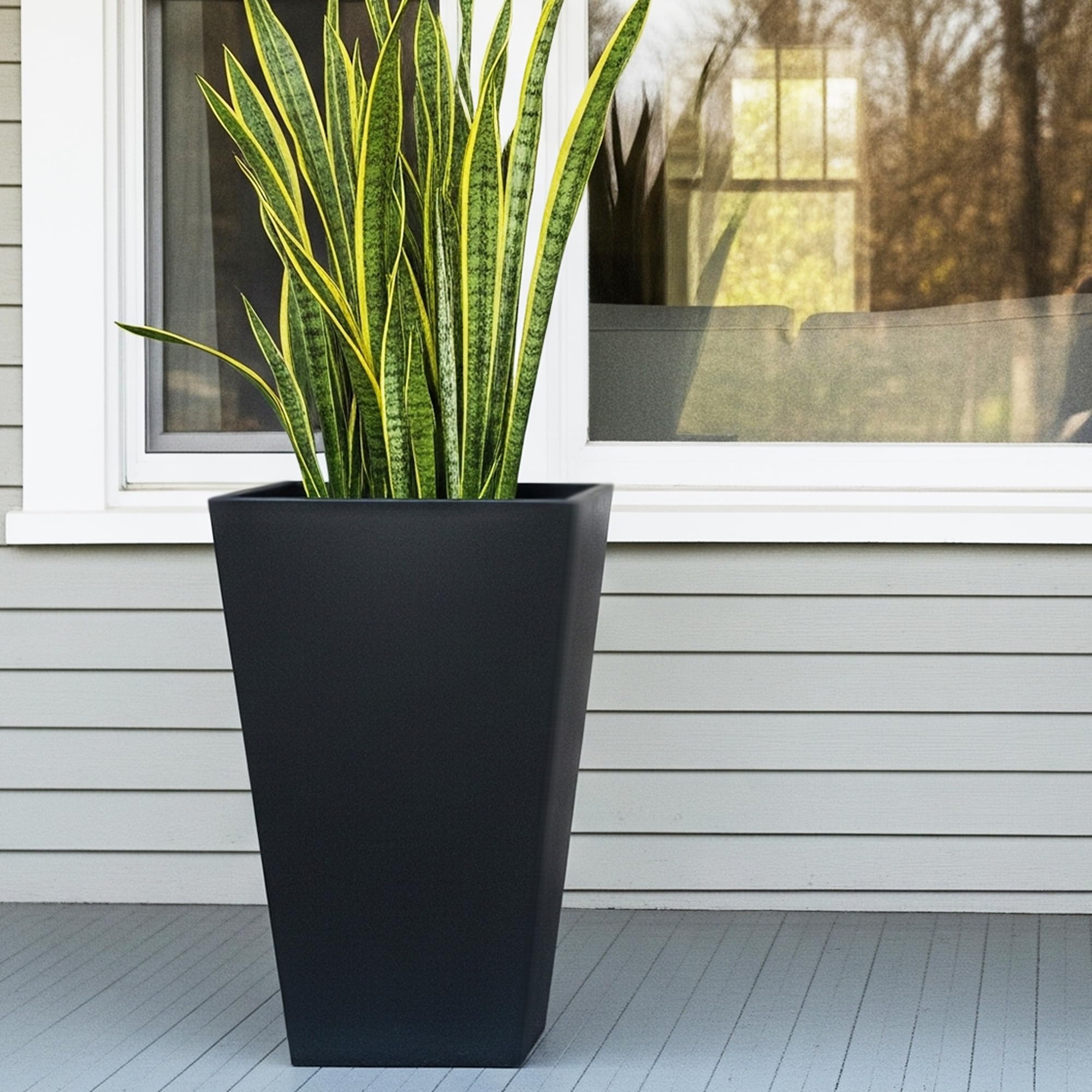 Worth Garden black tapered planters enhance modern exterior and entryways