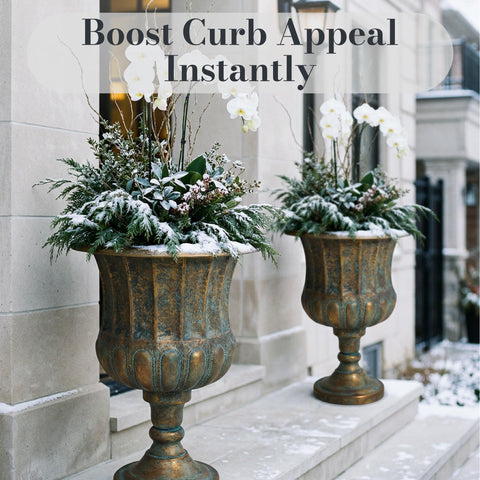 Worth Garden urn planters at entryway for a bold welcome.