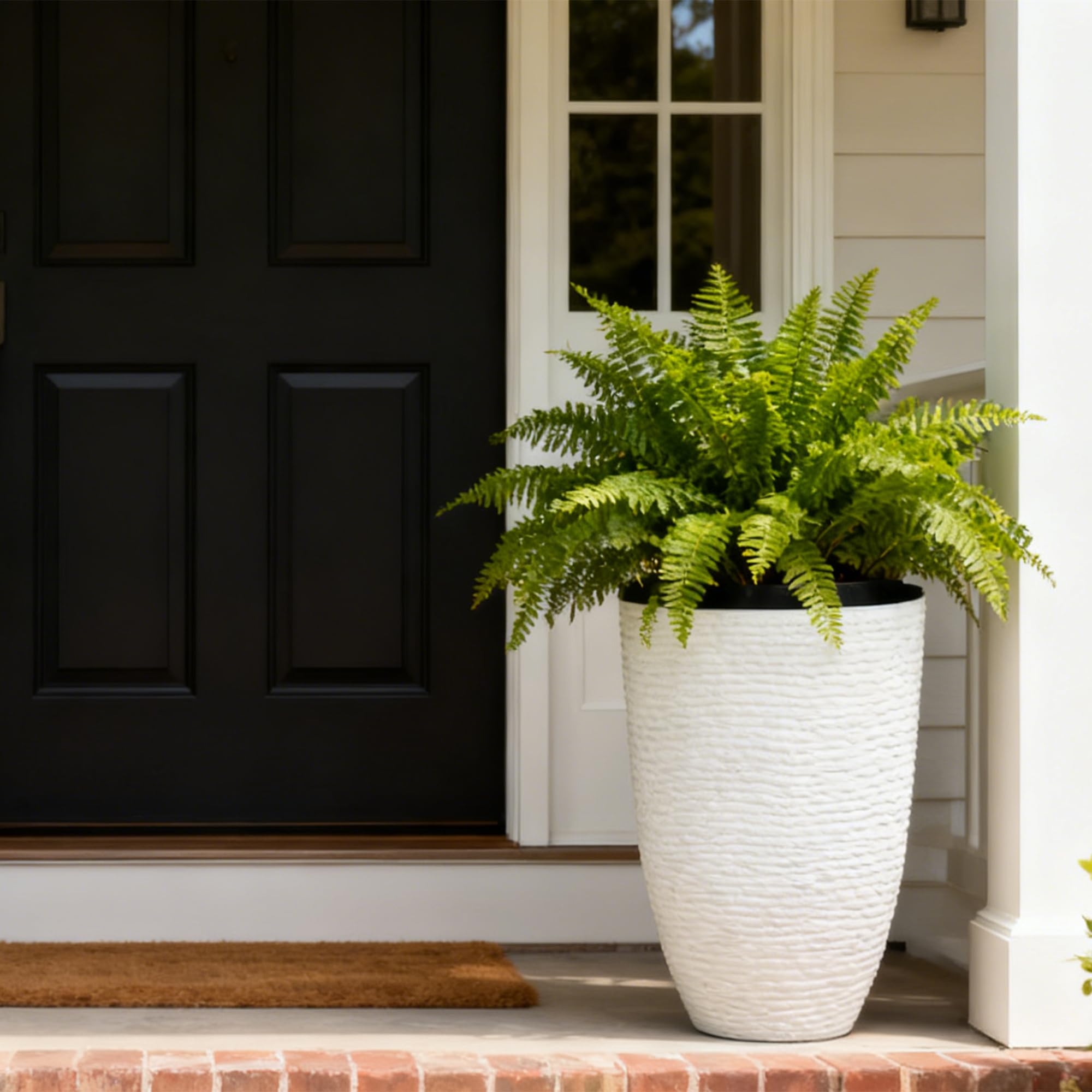 Worth Garden 14in round flower pot with stone finish adds curb appeal.