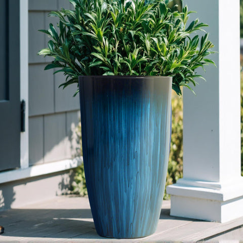 Worth Garden tall cylindrical planter supporting large plants indoors or outdoors