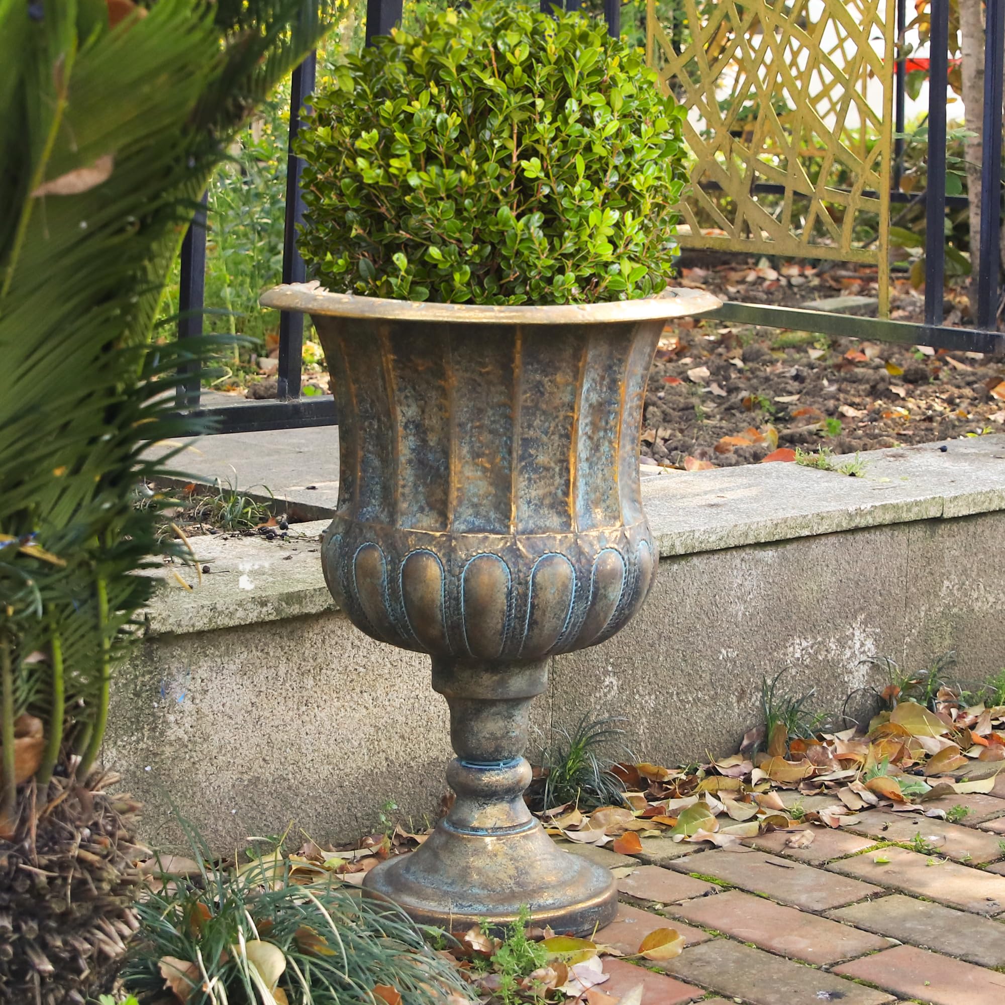 Worth Garden antique iron urn with weathered texture for porches.